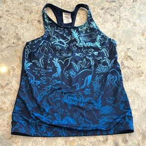 Girls Lands’ End swim tanking with blue marine animals